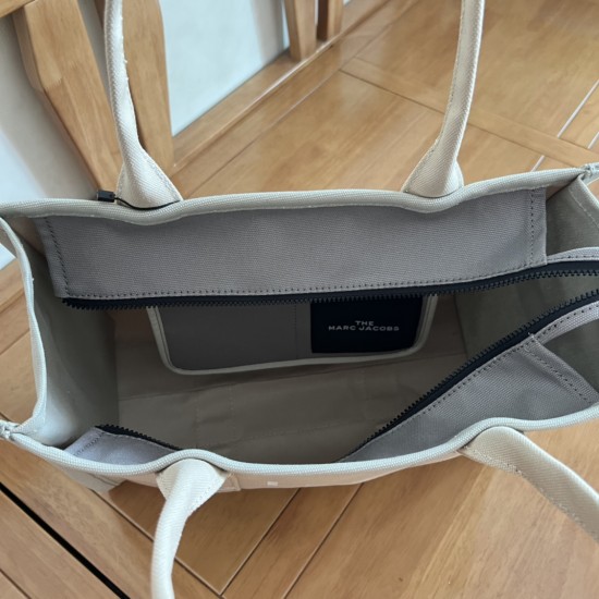 MJ Tote Full leather size: 41 * 34 * 15cm $140 Full leather medium size: 33 * 28 * 13cm $120 Full leather small size: 26 × 20 × 13cm $100 Fabric Large Size: 41 * 34 * 15cm $100 Medium size of fabric: 33 * 28 * 13cm $90 Fabric small size: 26 × 20 × 13cm $8